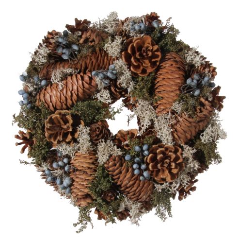 Advent moss wreath decorated with pine cones